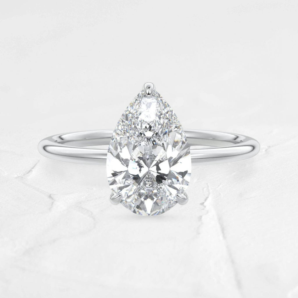 2.13CT Pear cut Solitaire Moissanite Ring in 925 Silver: 925 Sterling Silver / 8.75